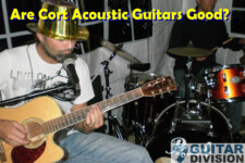 Man playing a Cort acoustic guitar with a band for a party
