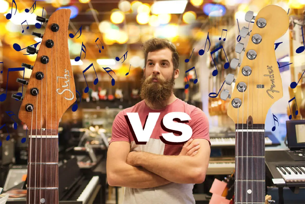 man in music shop with Suhr & Fender guitars