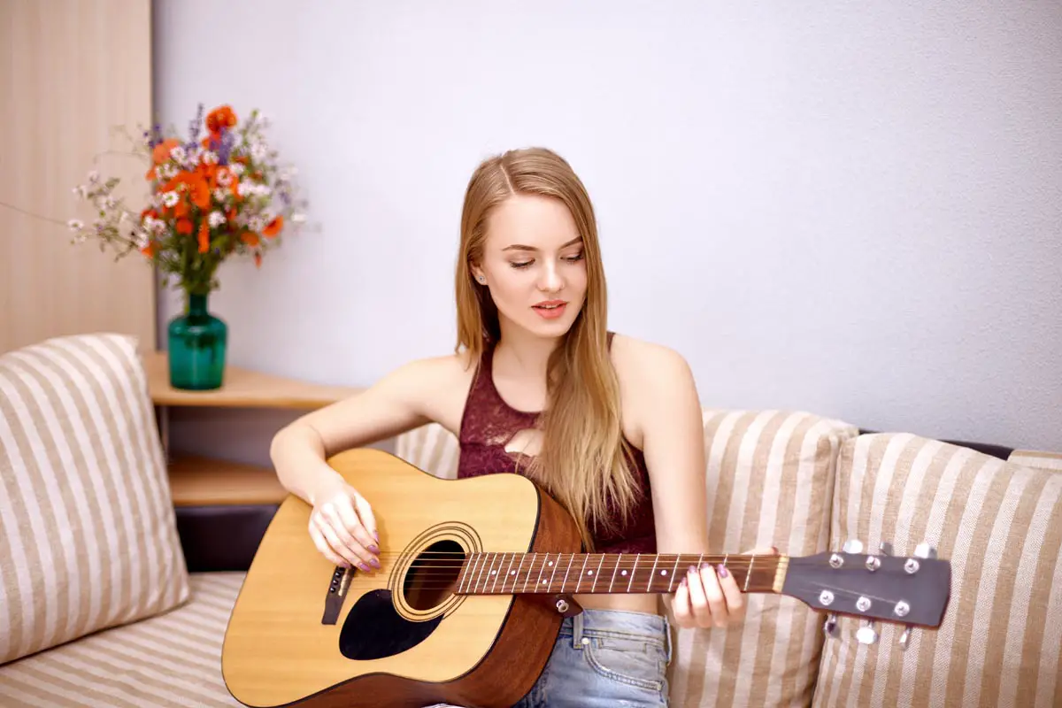 Girl Practicing Guitar