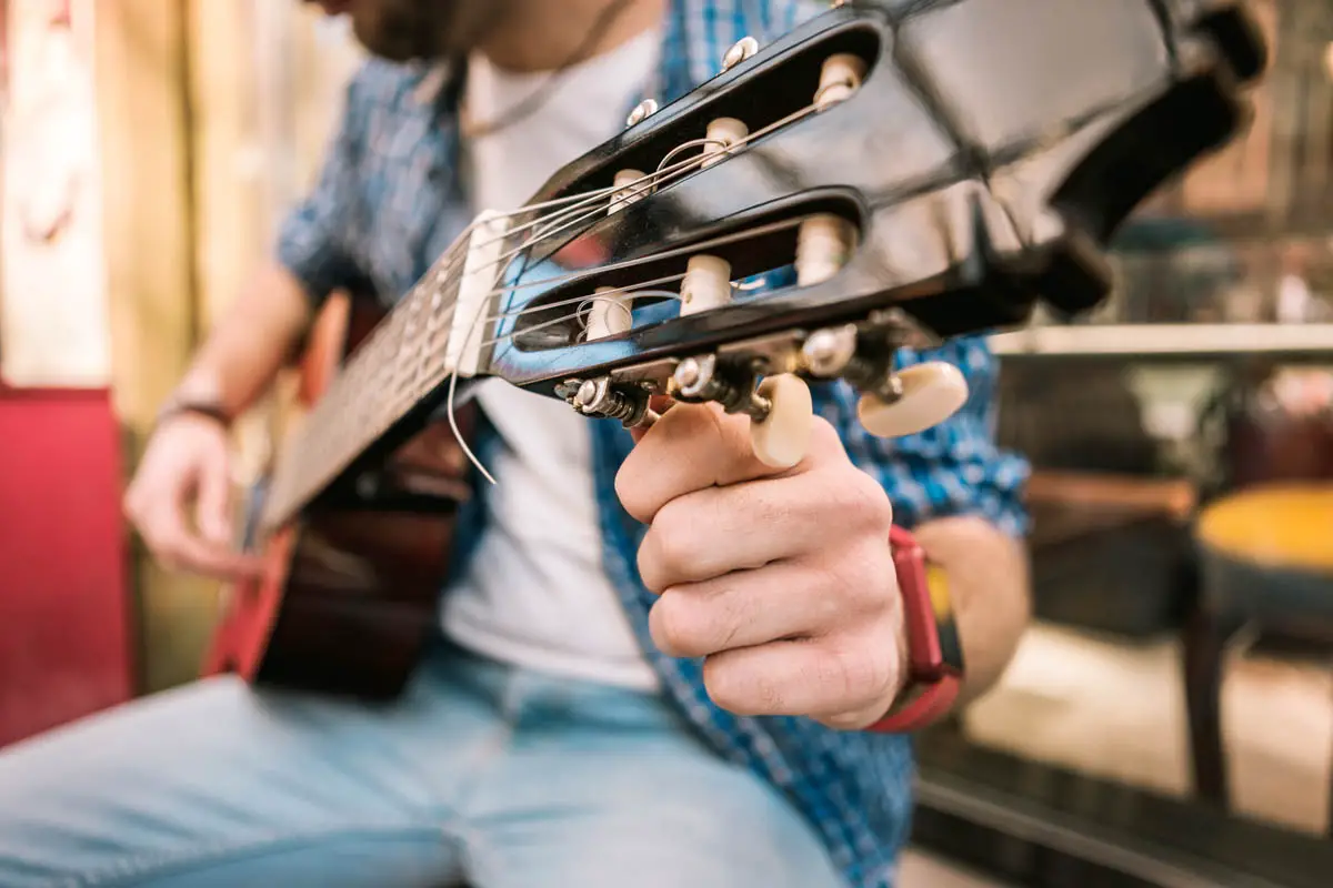 Tuning an acoustic guitar