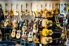 Assorted acoustic guitars in a music store