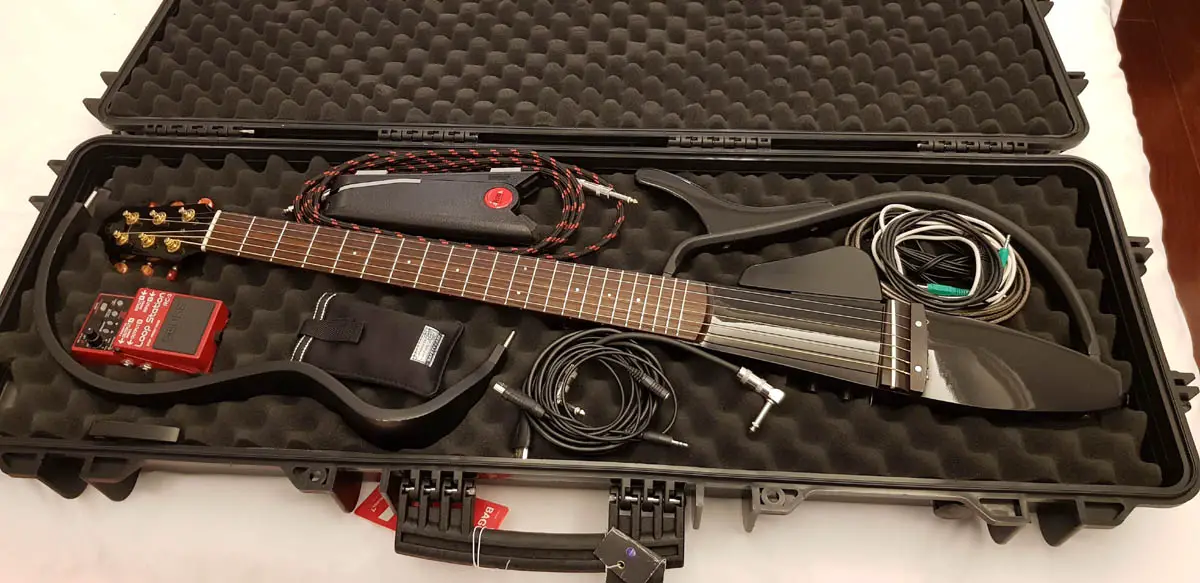 Yamaha SLG110S silent guitar packed in ABS plastic flight case
