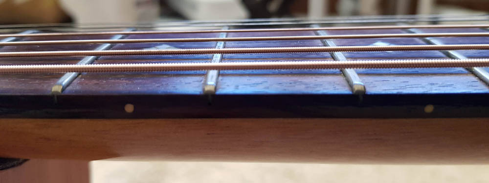 Closeup view of clean acoustic guitar strings